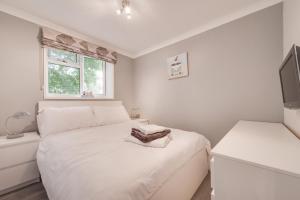 Postel nebo postele na pokoji v ubytování Jacka Shack