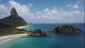 an aerial view of a beach in the ocean at Casa Mirafeliz in Fernando de Noronha