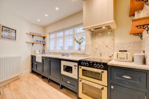 Kuchyň nebo kuchyňský kout v ubytování Guinevere