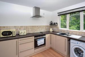 Η κουζίνα ή μικρή κουζίνα στο High Tide +6 φωτογραφίες