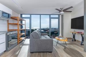 a living room with a couch and a table at Casco View Life in Panama City