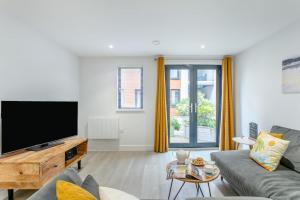 TV a/nebo společenská místnost v ubytování Sandy Corner - M2