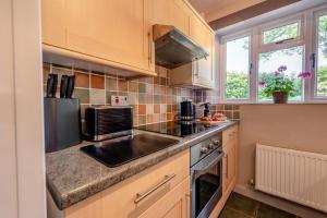 Η κουζίνα ή μικρή κουζίνα στο Smithies Cottage