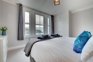 Postel nebo postele na pokoji v ubytování The Lodge@Kylgenna