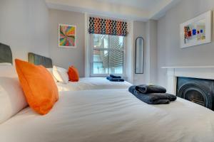 En eller flere senge i et værelse på 3 Bed in Fowey oc-p00803