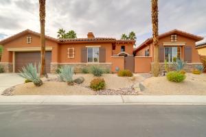 a house with palm trees in front of it at Private Pool and Spa Cathedral City Gem! in Cathedral City