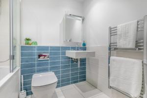 Koupelna v ubytování Coastal Corner - P6 + 16 fotografií