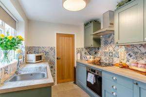 Køkken eller tekøkken på Bradbury Cottage