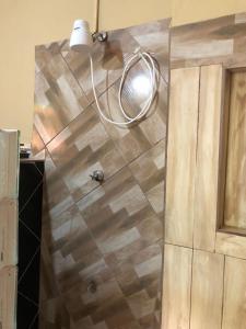 a shower in a bathroom with a wooden floor at River Valley View in Beaulieu +46 photos