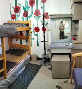 Una cama o camas en una habitación de 雅斤-淡水