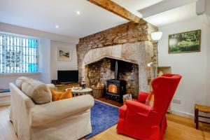 TV a/nebo společenská místnost v ubytování Hart Cottage