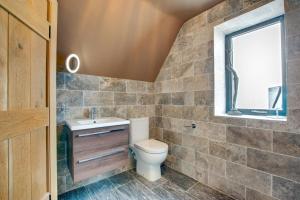 Ένα μπάνιο στο Driftwood Cottage - East Cliff