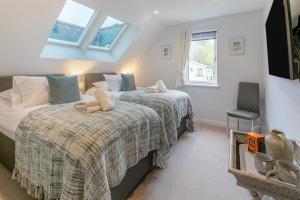 Postel nebo postele na pokoji v ubytování 11 The Old Station Masters House