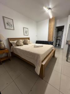 Ένα ή περισσότερα κρεβάτια σε δωμάτιο στο Mini Departamento