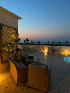 Fotografie z fotogalerie ubytování White&Blue Beachfront Luxury Suite v destinaci Ialyssos