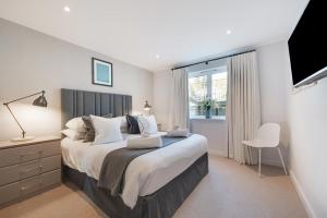 Postel nebo postele na pokoji v ubytování 7 The Old Station Masters House