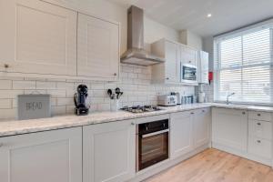 Kuchyň nebo kuchyňský kout v ubytování Grey Vine + 5 fotografií