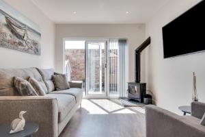 TV a/nebo společenská místnost v ubytování Grey Vine