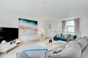 Televiisor ja/või meelelahutuskeskus majutusasutuses Pont View