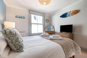 Voodi või voodid majutusasutuse Pont View toas