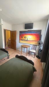 TV a/nebo společenská místnost v ubytování Gîte Anzi + 5 fotografií