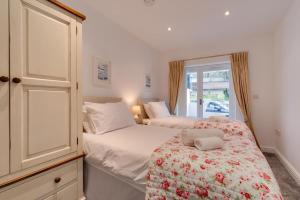 Postel nebo postele na pokoji v ubytování Rivers Reach