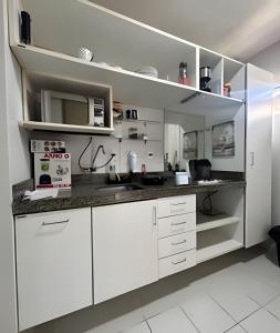 Kuchyň nebo kuchyňský kout v ubytování Estúdio próximo ao aeroporto com vaga na garagem