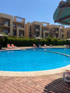 Bazén v ubytování bluebay asia chalet بلوباي اسيا nebo v jeho okolí