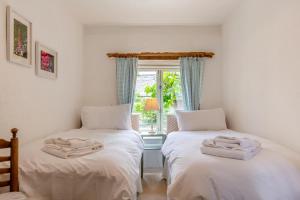 Postel nebo postele na pokoji v ubytování The Forge