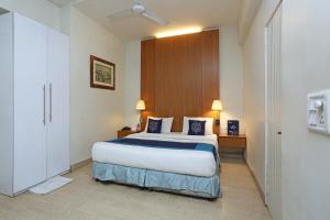 Postel nebo postele na pokoji v ubytování Hotel O Gem 92 + 36 fotografií