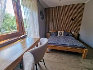 Postel nebo postele na pokoji v ubytování Trzy Żywioły - Bieszczady