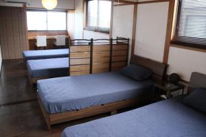 Katil atau katil-katil dalam bilik di Vation rental PIGGY'S nichinan - Vacation STAY 21067v