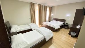 Afbeelding uit fotogalerij van PANORAMA Rooms Hotel near the Old Bazaar in Krujë +26 foto's