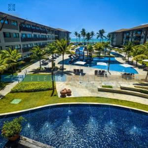 an overhead view of a swimming pool at a resort at La Fleur Collection Vacation Homes - Residence & Resort in Porto De Galinhas