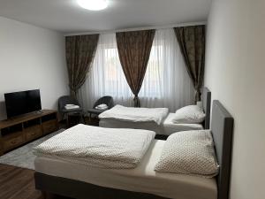 Ένα ή περισσότερα κρεβάτια σε δωμάτιο στο Luxury Private Rooms