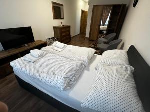 Ένα ή περισσότερα κρεβάτια σε δωμάτιο στο Luxury Private Rooms