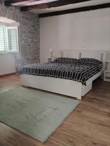 Ένα ή περισσότερα κρεβάτια σε δωμάτιο στο Judita +14 φωτογραφίες