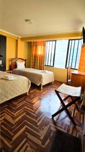 Postel nebo postele na pokoji v ubytování Rayos Del Sol