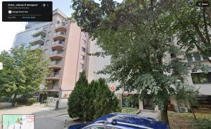 a blue car parked in front of a building at D-home in Sofia +39 photos
