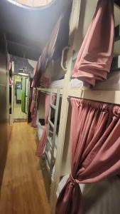 a group of bunk beds in a room at Lucky beds pg and hostel in Mumbai