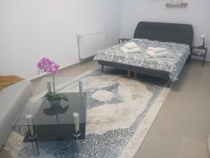 Ένα ή περισσότερα κρεβάτια σε δωμάτιο στο Fufy's apartment