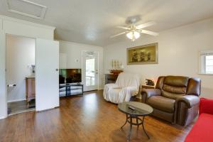 a living room with a couch and a chair at Bike and Hike On-Site Inviting Cleveland Retreat! in Cleveland