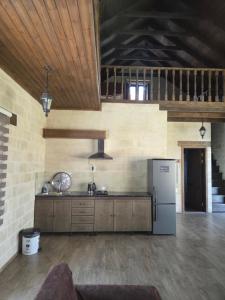 Dapur atau dapur kecil di Qusar Apartments