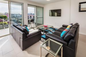 Posezení v ubytování Hamilton Executive Apartments