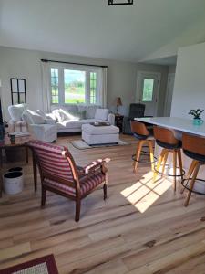 Posezení v ubytování Cozy Country Cottage + 5 fotografií