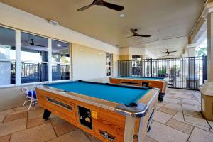 a room with a pool table in a house at Windsor Hills Resort - Water Park - Private Heated Plunge Pool - Near Disney in Orlando