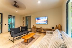 TV a/nebo společenská místnost v ubytování La Cueva de Piedra