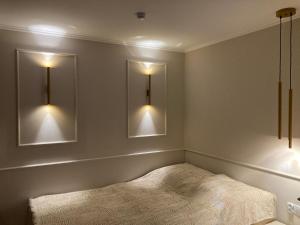 Ένα ή περισσότερα κρεβάτια σε δωμάτιο στο Apartament KAJA
