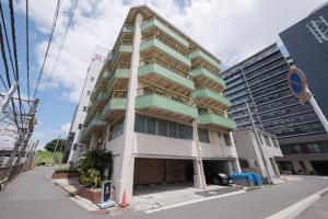 a tall building on the corner of a street at Disney Style Hotel "J Hotel" - Vacation STAY 17216v in Chiba
