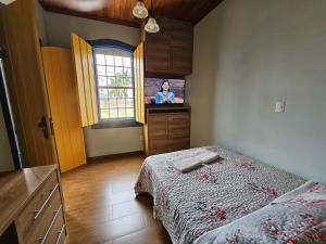 Letto o letti in una camera di Solar das Oliveiras